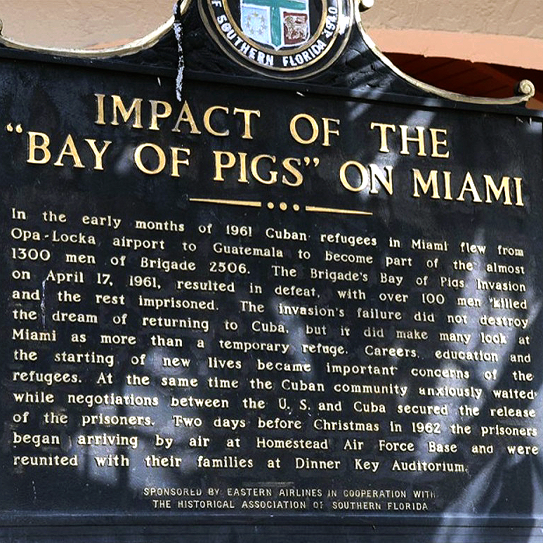 Historical marker titled Impact of the Bay of Pigs on Miami, describing Cuban refugees, Brigade 2506, and the 1961 invasion's effect on Miami's Cuban community