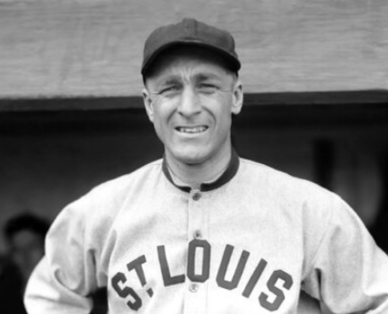 Baseball player in a St. Louis uniform smiling, black and white photo