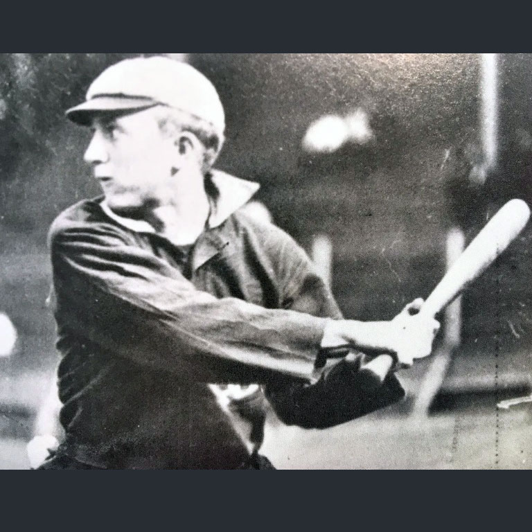 1904 photo of baseball player, Ty Cobb, swinging a bat