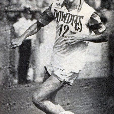 Rowdies player, Van d Beck, running, with only torso and legs showing in the photo