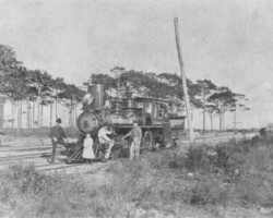 Peter Demens and his daughters pose next to Orange Belt Railway (OBRY) Locomotive No. 10. Note the OBRY logo on the train. c. 1888. Peter Demens and his daughters pose next to Orange Belt Railway (OBRY) Locomotive No. 10. Note the OBRY logo on the train. c. 1888.
