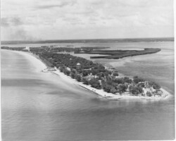 Aerial view of Pass-a-Grille looking north. Pass-a-Grille Beach Hotel & Casino can be seen on the beach, center left. Don CeSar Hotel is in the top left. Smoke from a large fire is in distance. c. 1940 Aerial view of Pass-a-Grille looking north. Pass-a-Grille Beach Hotel & Casino can be seen on the beach, center left. Don CeSar Hotel is in the top left. Smoke from a large fire is in distance. c. 1940