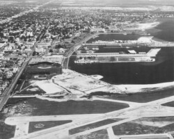 Aerial view of the Bayfront Center under construction. Land fill is complete, and the first steel beams are going up. c. 1963 Aerial view of the Bayfront Center under construction. Land fill is complete, and the first steel beams are going up. c. 1963