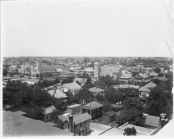Elevated view looking northwest from about 2nd Ave. N. and 3rd St. Trinity Lutheran is in the center of the frame, and the newly built Coliseum is at left-center. The Lawn Bowling Club is also at left-center. c. 1925 Elevated view looking northwest from about 2nd Ave. N. and 3rd St. Trinity Lutheran is in the center of the frame, and the newly built Coliseum is at left-center. The Lawn Bowling Club is also at left-center. c. 1925