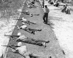 Merchant Marine recruits at a firing range as part of World War II training. c. 1943.
