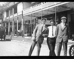R.G. Key (C), James Johnson (R), and unidentified man on Central Ave. Rex Theater seen in background. This is the north side of Central Ave, between 1st and 2nd Sts. c. 1912 R.G. Key (C), James Johnson (R), and unidentified man on Central Ave. Rex Theater seen in background. This is the north side of Central Ave, between 1st and 2nd Sts. c. 1912