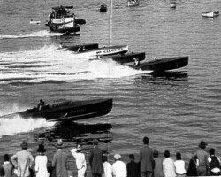 Speedboats racing past spectators at Lake Maggiore. c. 1940