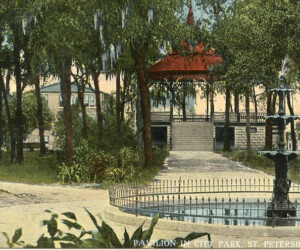 Williams Park, "Pavilion in City Park," view of part of fountain right foreground, pavilion center mid-foreground, residences in backround, no people.
