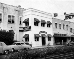 Police Headquarters on 1st Ave S. Widere & Smith printing just east, Bainbridge Hotel on corner of 3rd St. S. in background. c. 1952. Police Headquarters on 1st Ave S. Widere & Smith printing just east, Bainbridge Hotel on corner of 3rd St. S. in background. c. 1952.