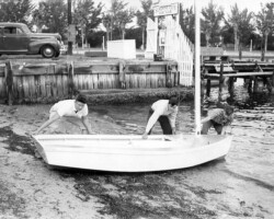 Sunshine City Boat Club launching a small boat into Central Yacht Basin. c. 1935