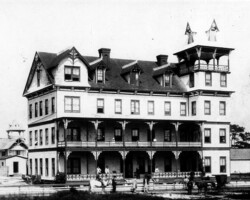 Detroit Hotel, seen from Central Avenue side. Several people and a horse & buggy stand out front. c. 1897 Detroit Hotel, seen from Central Avenue side. Several people and a horse & buggy stand out front. c. 1897