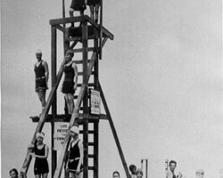 Swimmers at the diving platform at Spa Beach. c. 1923.