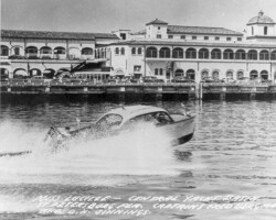 'Miss Lucille' passing the south side of the Million Dollar Pier. Pier Grille Drive-In seen. c. 1940