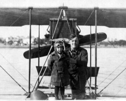 Johnny Green and Jimmy Farmer in front of a Curtiss S-boat, c. 1921. Johnny Green and Jimmy Farmer in front of a Curtiss S-boat, c. 1921.