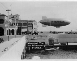Goodyear blimp RELIANCE over Municipal Pier. c. 1930