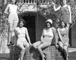 Women pose on the well at the Rolyat Hotel for publicity photo. c. 1928. Women pose on the well at the Rolyat Hotel for publicity photo. c. 1928.