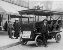 Andy Baker, owner of the alligator farm, and his sightseeing bus on Central Ave. c. 1920