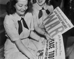 Two women in uniform read the St. Petersburg Times report on Japan's surrender on what is now known as V-J Day. 14 August 1945. Two women in uniform read the St. Petersburg Times report on Japan's surrender on what is now known as V-J Day. 14 August 1945.