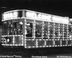 Trolley car #45 decorated for Christmas. c. 1940 Vintage black-and-white photo of the Santa Land Special Trolley decorated with lights for Christmas in St. Petersburg, Florida