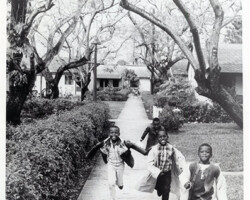 Children playing in Jordan Park. Developed by Elder Jordan, Sr., it is Florida's oldest federally-funded housing project. c. 1940s. Children playing in Jordan Park. Developed by Elder Jordan, Sr., it is Florida's oldest federally-funded housing project. c. 1940s.