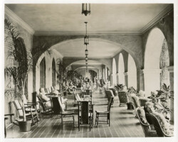Guests relax and socialize on the promenade of the Vinoy Hotel. Guests relax and socialize on the promenade of the Vinoy Hotel.