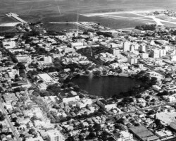 Aerial view looking southeast, c. 1950. Mirror Lake is in the center, with the Million Dollar Pier, Yacht Basin, and Whitted Airport along the shore, left to right. Aerial view looking southeast, c. 1950. Mirror Lake is in the center, with the Million Dollar Pier, Yacht Basin, and Whitted Airport along the shore, left to right.